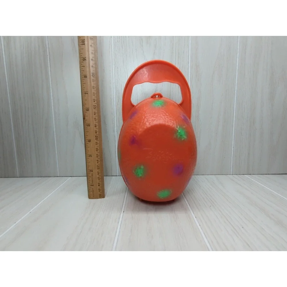 Busch Gardens Land of the Dragons orange egg carry case green baby dragon